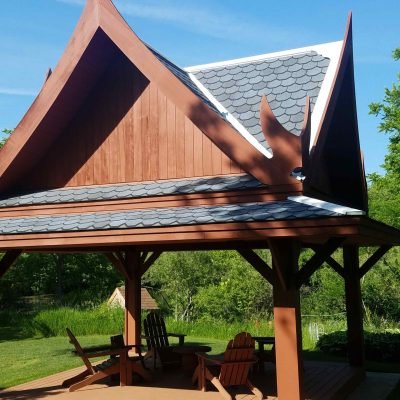 Outdoor wooden pavilion with newly installed roof for lasting weather protection